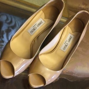 Nude peep toe pumps